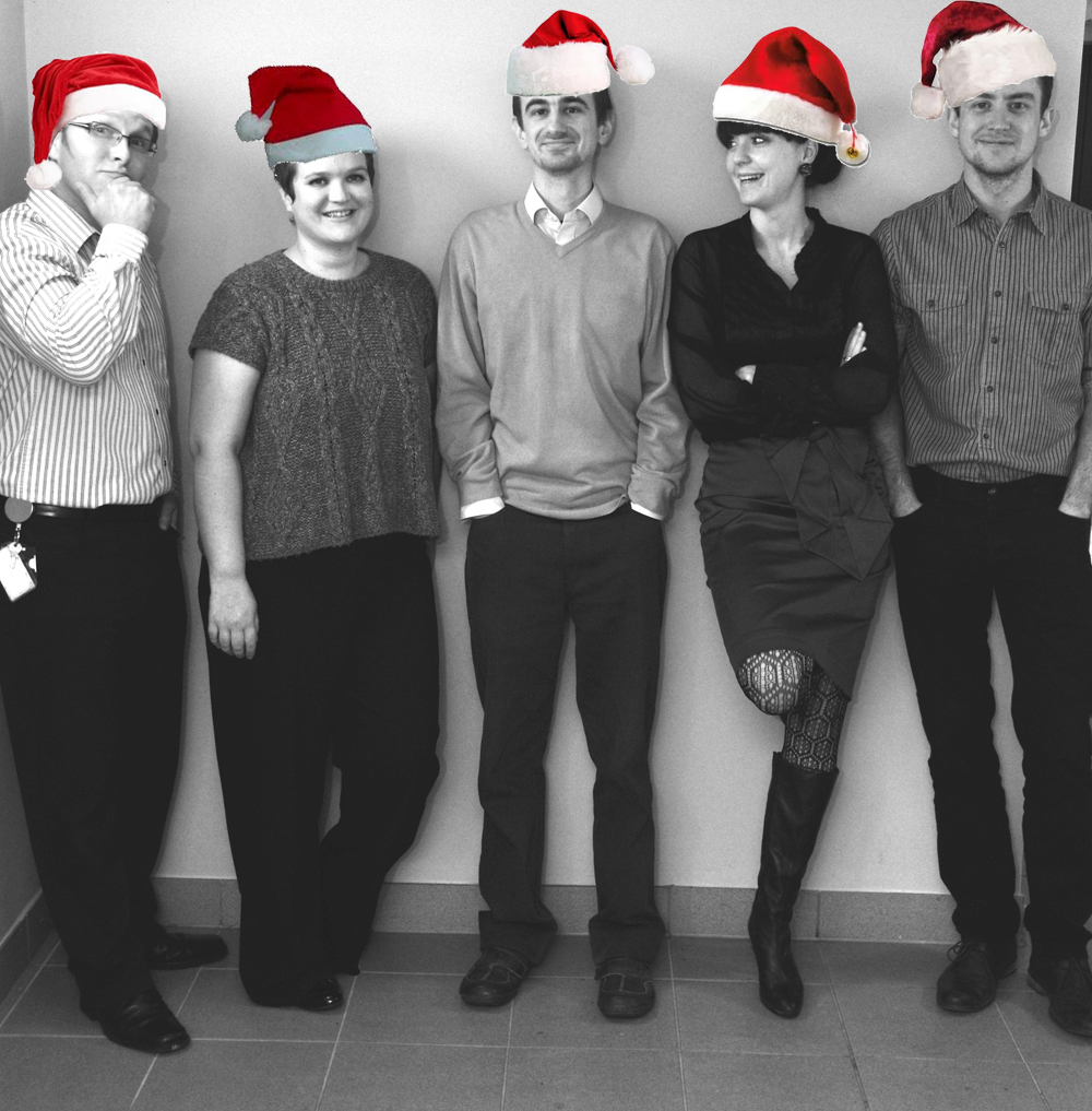 A photo of the members of Project WIP with Santa hats added!